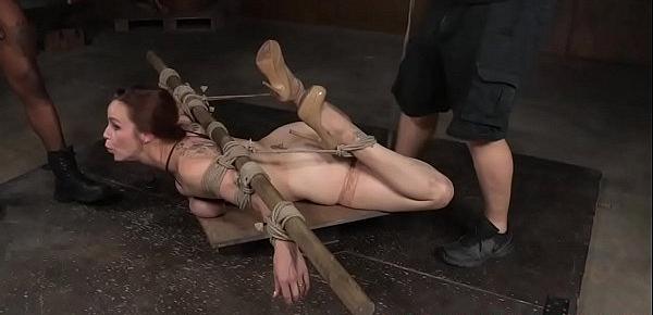  Redhead slave throatfucked while restrained